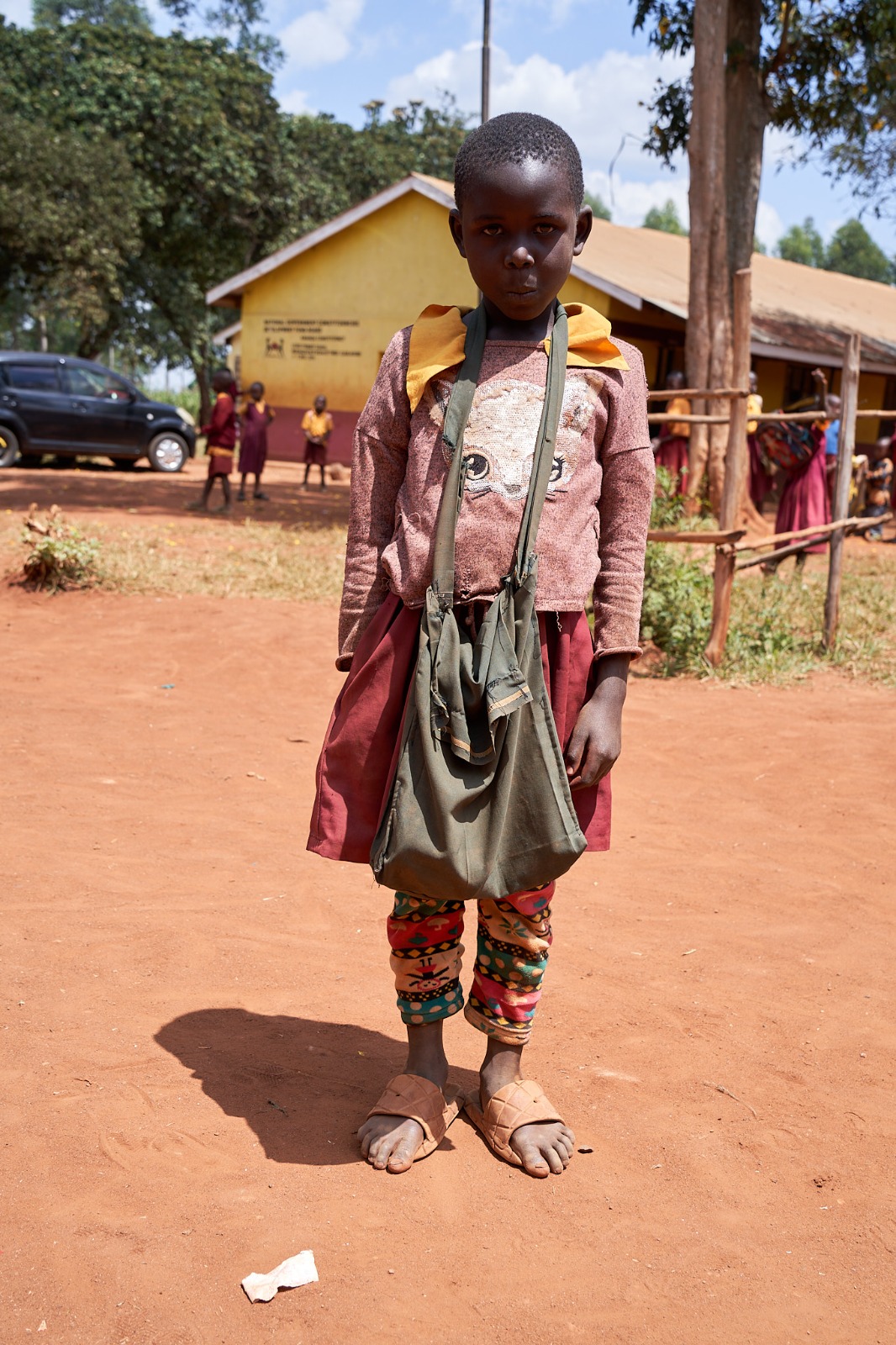 Before: a learner in mismatched clothing and worn sandals