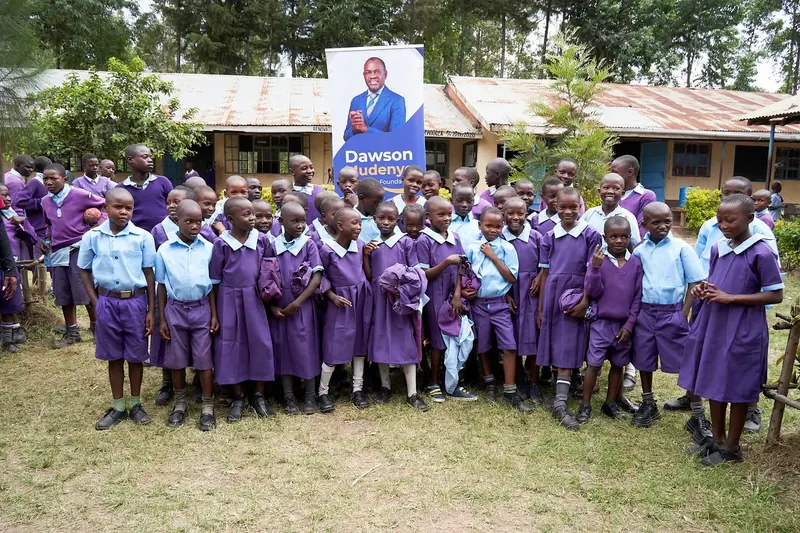 Scholarship learners in school uniform gathered outdoors at a school event