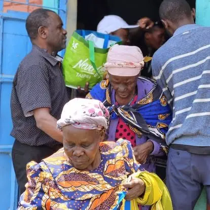 Elderly community members receiving support at a Forgotten People outreach