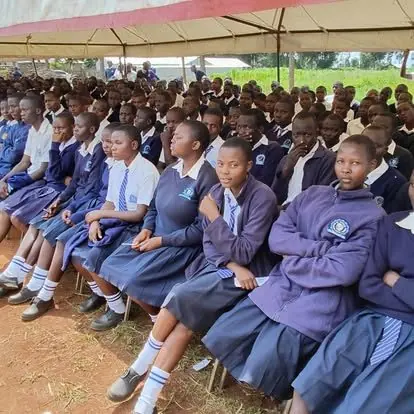 Scholarship students seated at a program assembly
